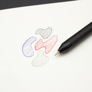 Bolígrafo de tres colores y portaminas juntos