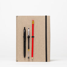 Load image into Gallery viewer, Portada con gomas para llevar tus lápices, rotuladores o herramientas.